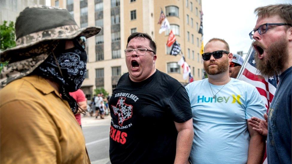 People protest against mandates to wear masks amid the coronavirus outbreak in Austin, Texas, 28 June 2020