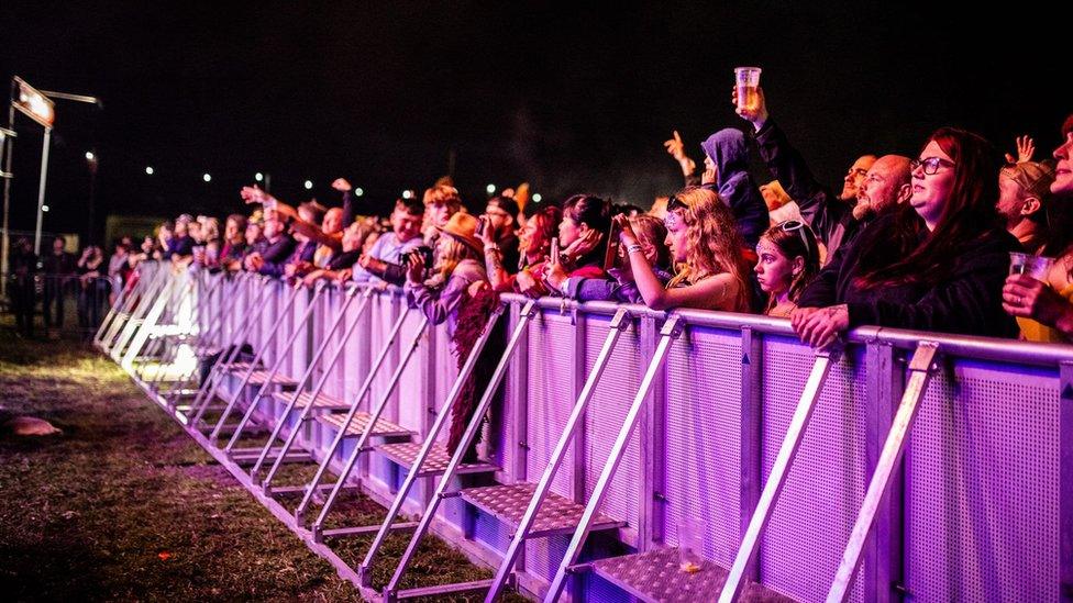 Crowd at barrier at The Godney Gathering