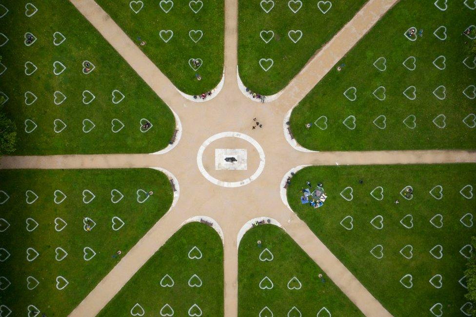 An aerial view of Queen Square where hearts have been sprayed onto the grass in an effort to encourage social distancing on 8 July 2020 in Bristol, England.