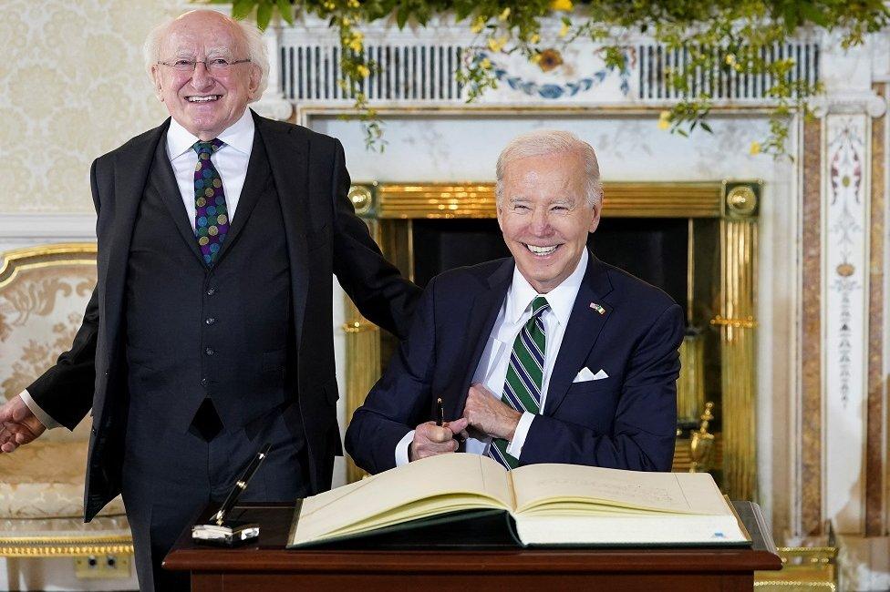 U.S. President Joe Biden shakes hands with Irish President Michael Higgins, in Dublin, Ireland