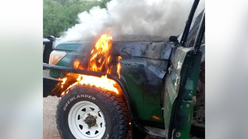 Four wheel drive car on fire