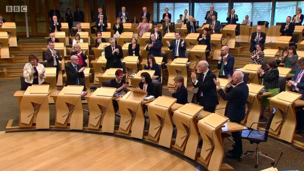 MSPs clapping