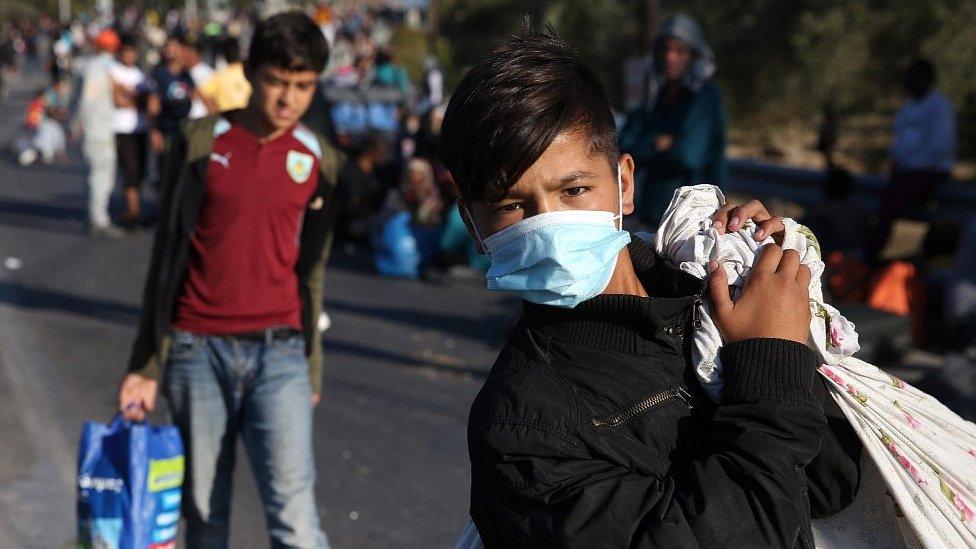 Moria migrants on road after fleeing burning camp, 10 Sep 20