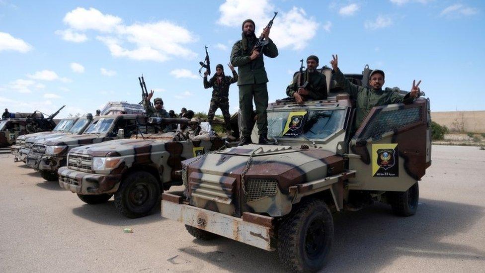 Libyan National Army (LNA) members, commanded by Khalifa Haftar, pose for a picture