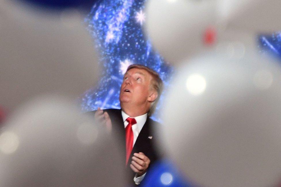 Donald Trump looks up at balloons during the Republican National Convention