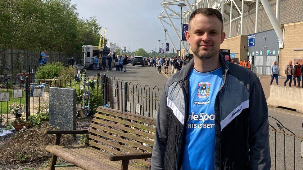 A Sky Blues fan outside the CBS Arena