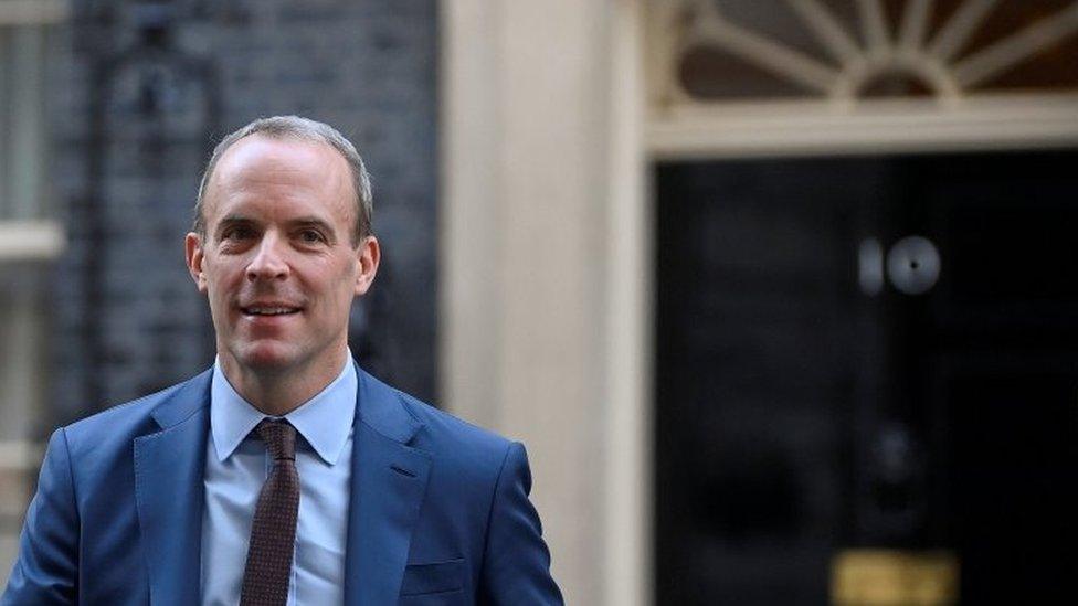 Dominic Raab walks outside No 10 Downing Street