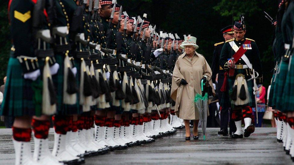 Britain's Queen Elizabeth inspects soldiers from the Royal Regiment of Scotland, during the Ceremony Of The Keys at Holyrood Palace in Edinburgh, Scotland July 2, 2012. The ceremony marks the start of Holyrood Week in Scotland with the Queen and her husband Prince Phillip attending Diamond Jubilee events across the country. REUTERS/David Moir