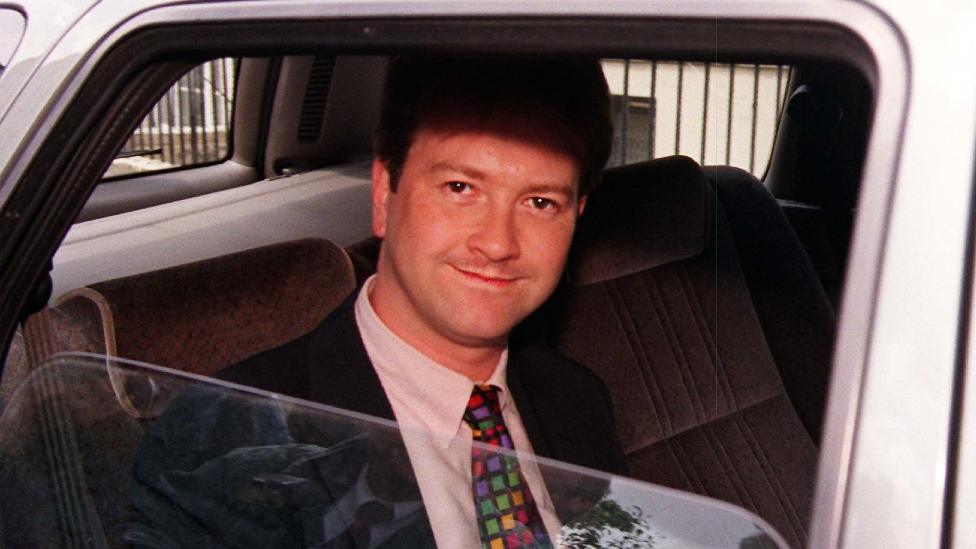 Derek Draper, a former aide to Minister without Portfolio Peter Mandelson, leaves his home in north London in 1998