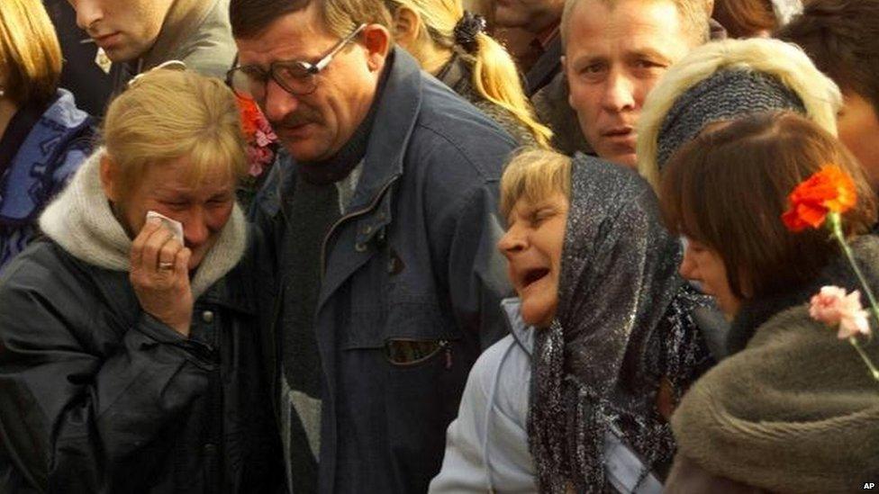 Relatives of those on board the Kursk shed tears during a 2000 memorial