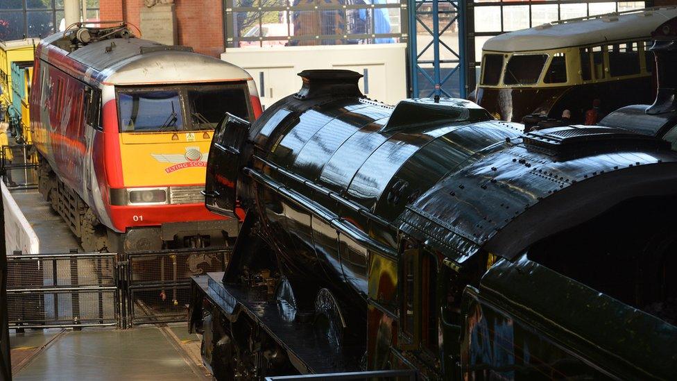 Virgin Trains power car and Flying Scotsman at National Railways Museum, in York.