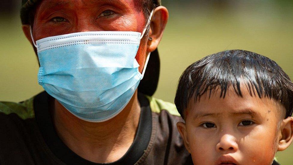 Yanomami man and child