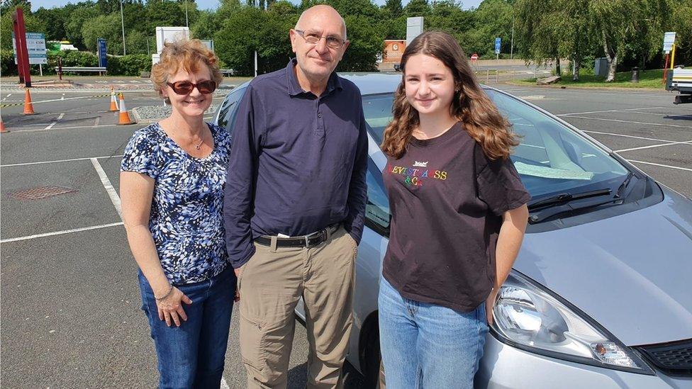 Higher education teacher Thomas Despositos, a German national, with wife Julia Turrell and daughter Isabella