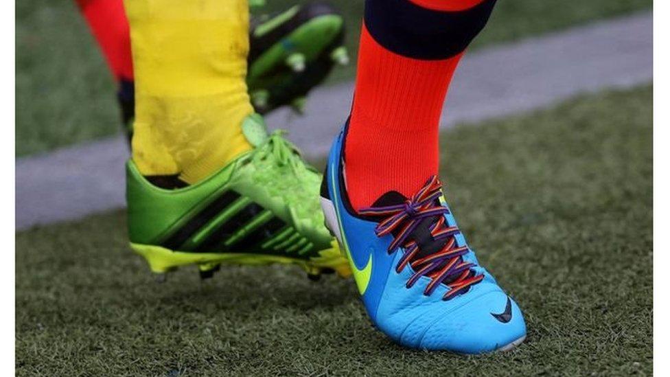 Rainbow shoelaces worn by players