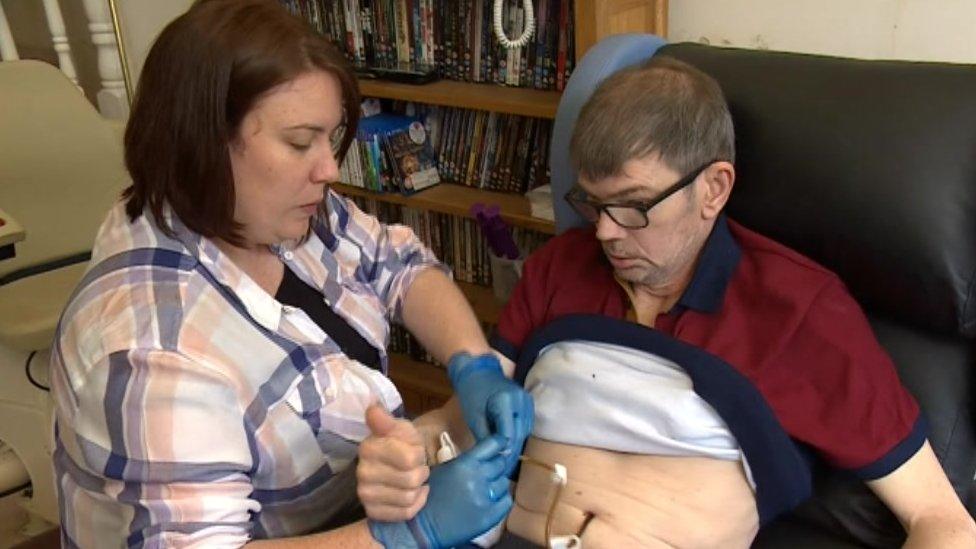 Roy Baker with his carer Rosie Morfitt.