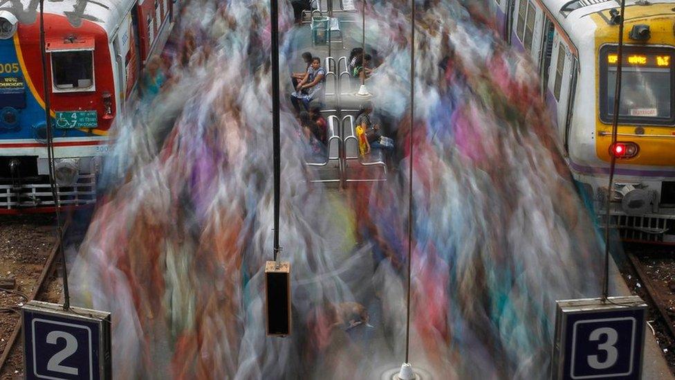 Commuters at Churchgate railway station in Mumbai in 2012