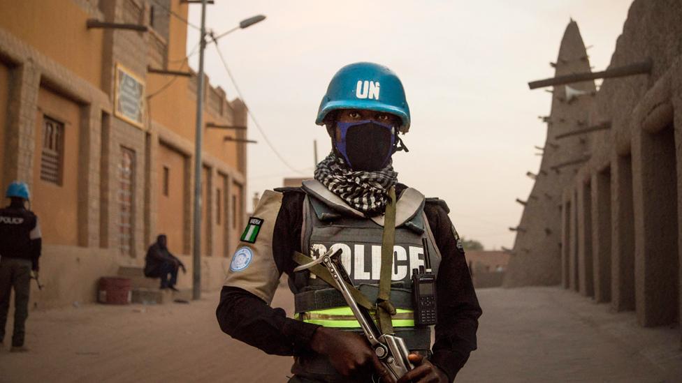 UN policemen on patrol in front on the Great Mosque in Timbuktu - 2021