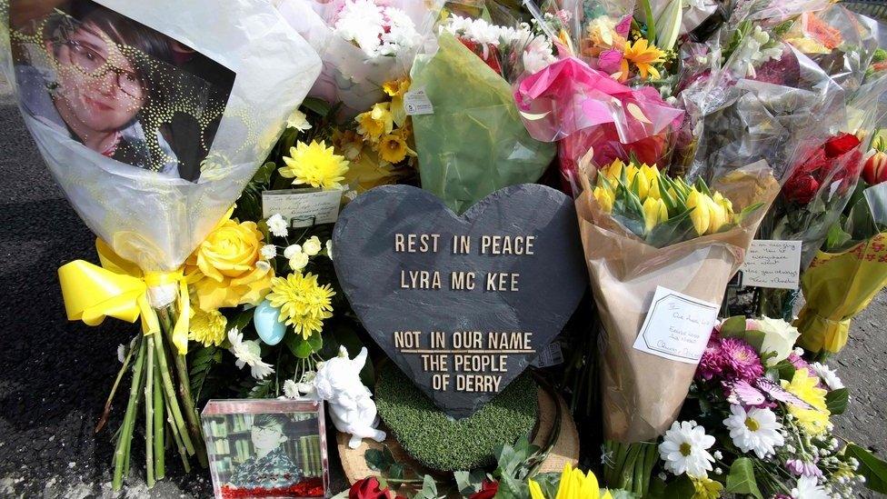 Floral tributes laid at the scene where Lyra McKee was shot in Londonderry