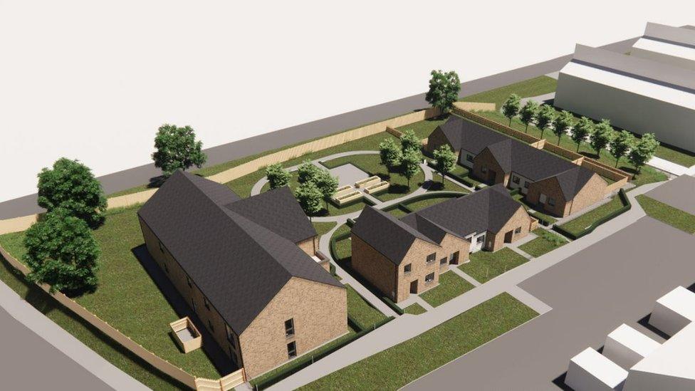 Artists impression of flat block and bungalow