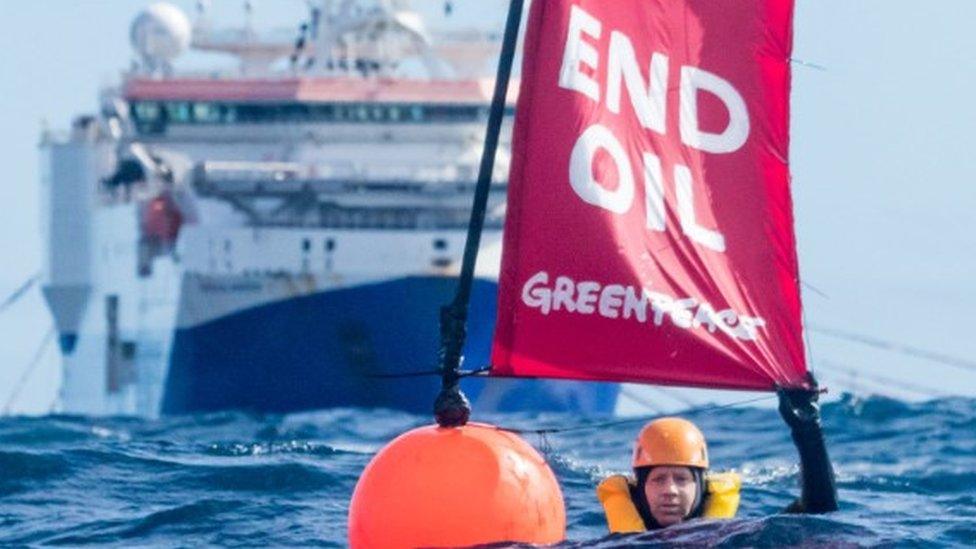 One of the protesters in the water