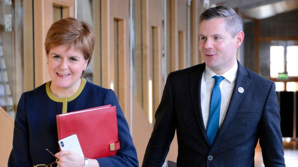 Nicola Sturgeon and Derek Mackay