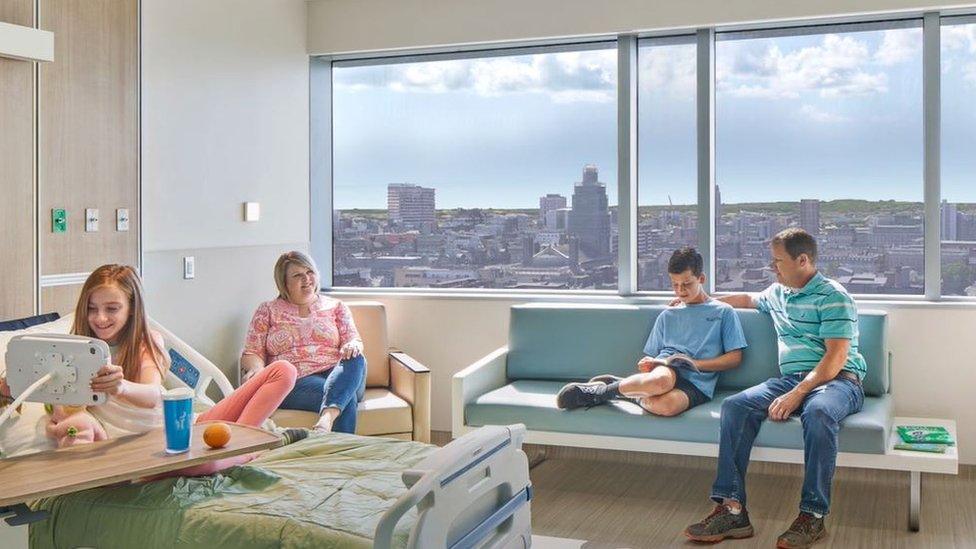 A CGI of a family inside a new hospital room