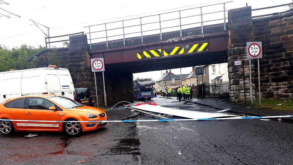 A First Bus double decker hit a railway bridge in Wishaw