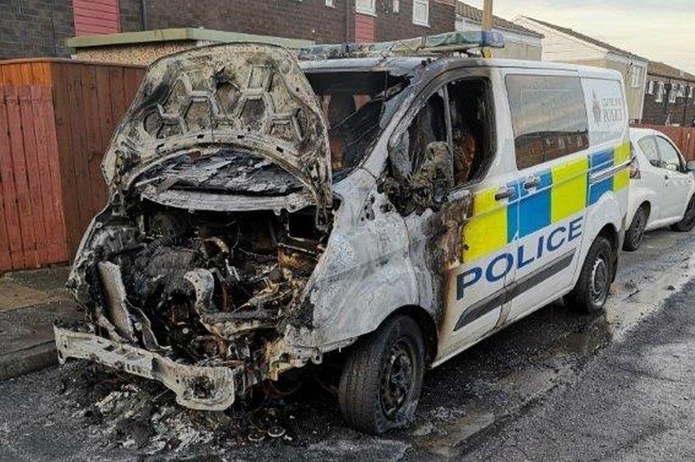 The fire-damaged Cleveland Police van