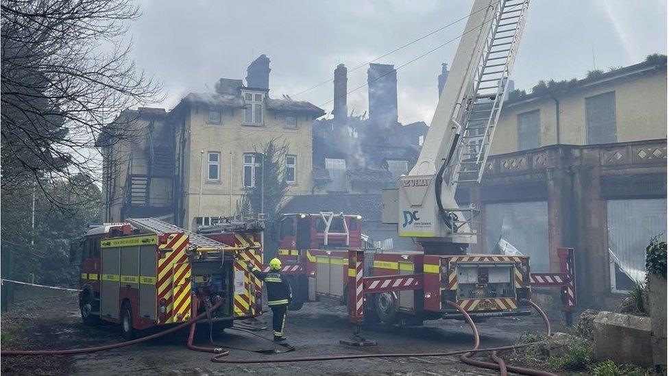 Fire services putting out a fire at the old council offices