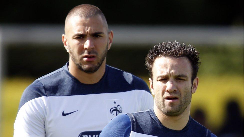 File photo of France's national soccer team players Mathieu Valbuena and Karim Benzema attending a training session in Clairefontaine, near Paris