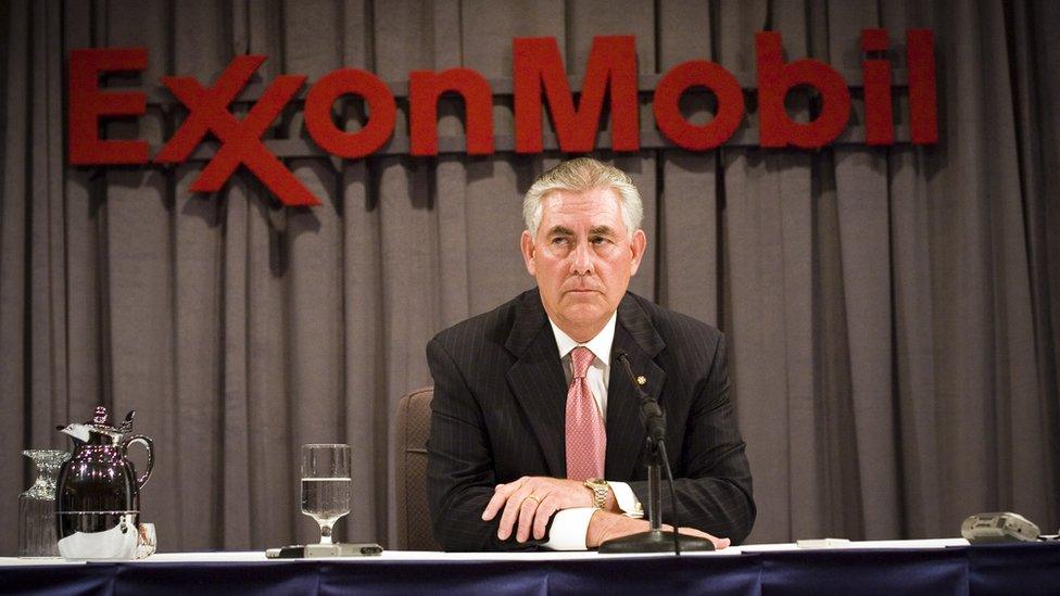 ExxonMobil head Rex Tillerson sits at a shareholder meeting in Dallas.