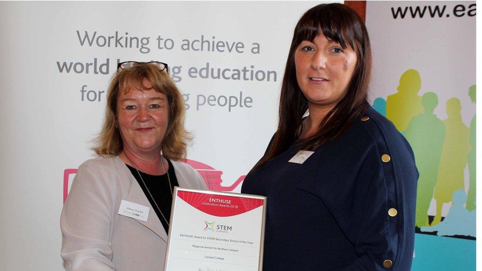 STEM Learning's Hilary Drabble awarding a Northern Ireland ENTHUSE Partnership Secondary School of the Year Award to Lorraine Loughery on behalf of Linseal Secondary School.