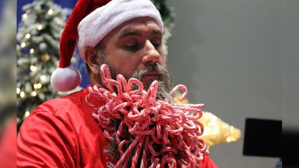 Joel with the most candy canes in a beard