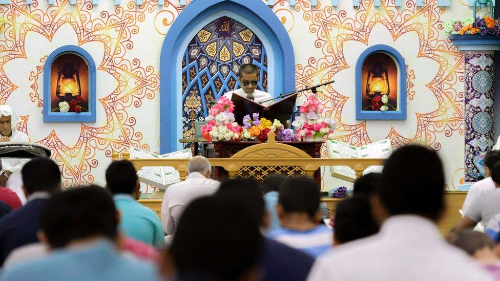 A man reads from the Holy Koran in a mosque in Saudi Arabia