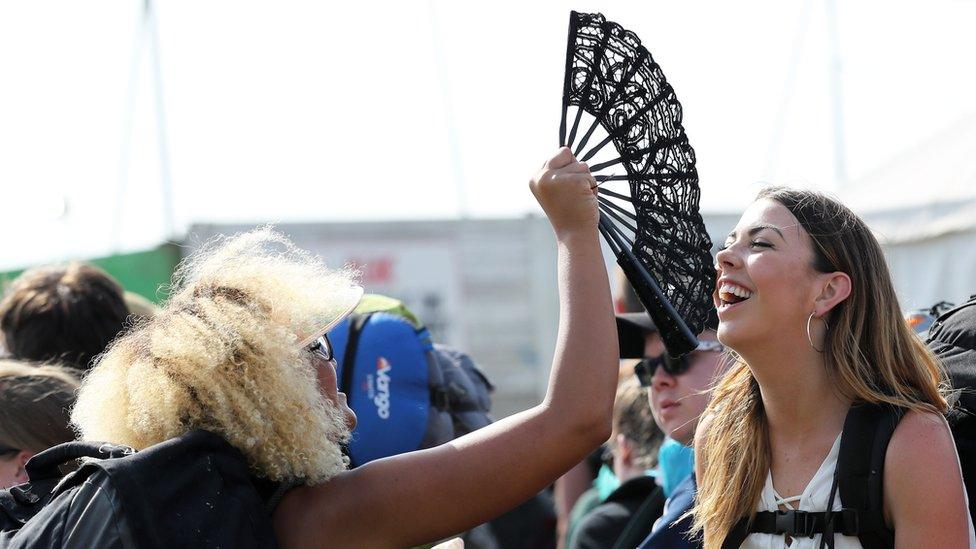 Woman being fanned