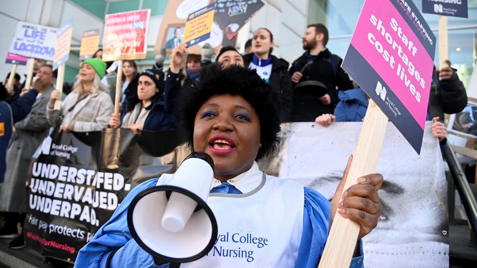 Nurses protest during a strike by NHS medical workers