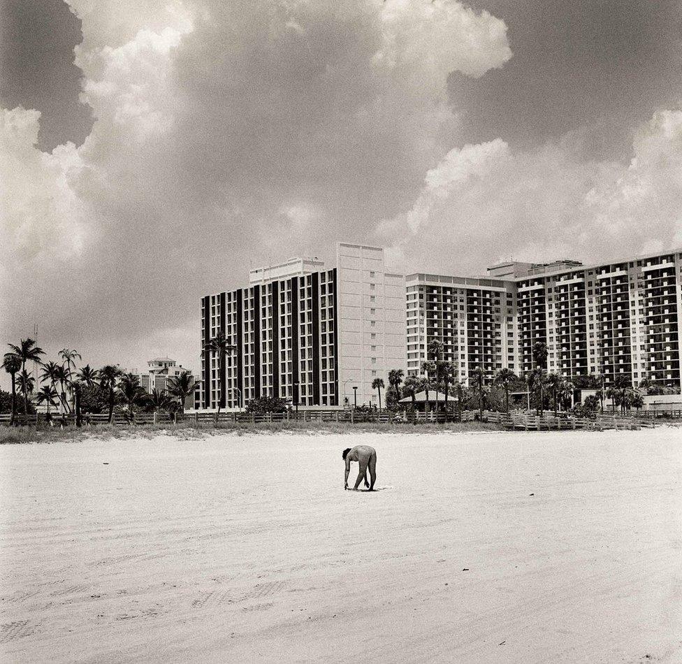 A person exercises on Miami Beach