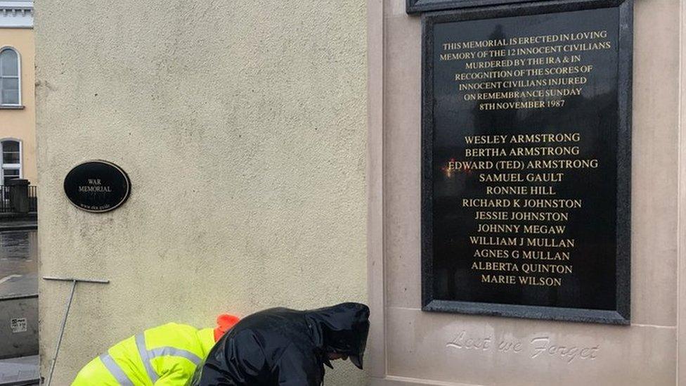 Memorial being installed by workers