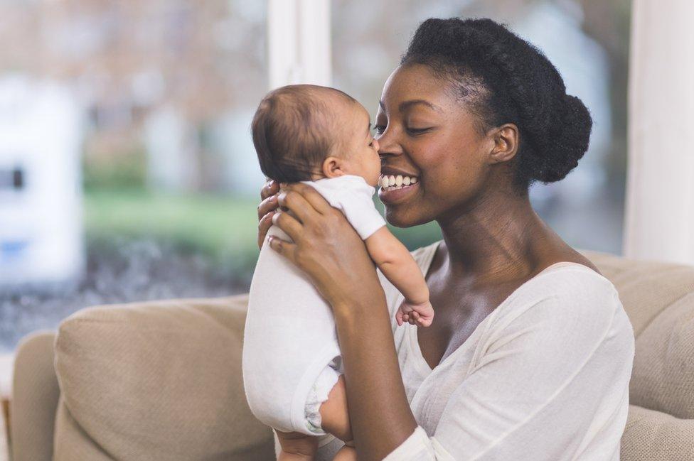 Mother holding baby