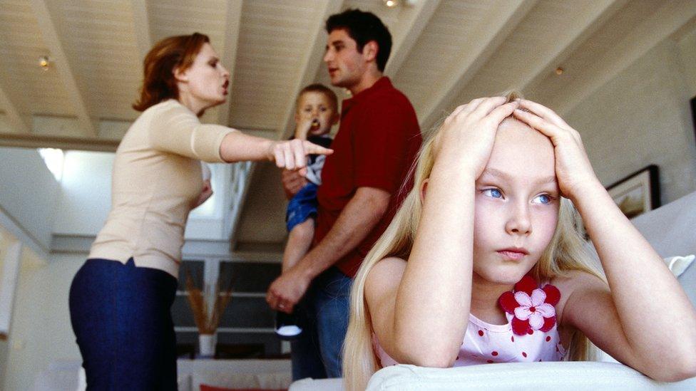 Parents arguing in front of children (Posed by models)