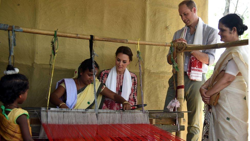 The Royal couple watch an Indian woman make hand woven cloth