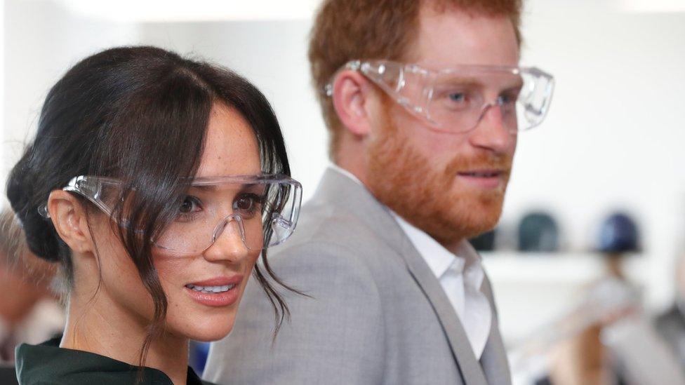 The Duke and Duchess of Sussex don goggles in an engineering lab