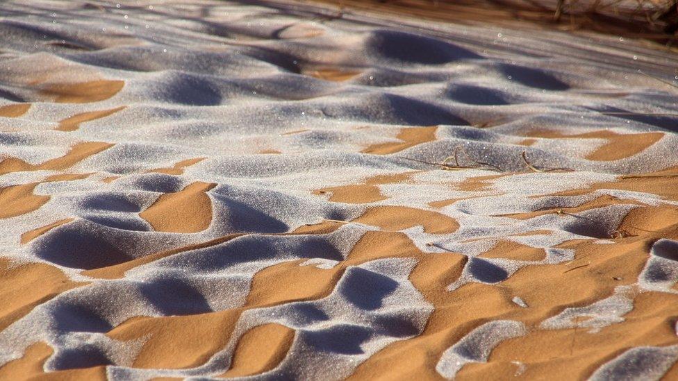 Picture dated January 8th shows a covering of snow and ice in the Sahara Desert near Ain Sefra in northwestern Algeria.