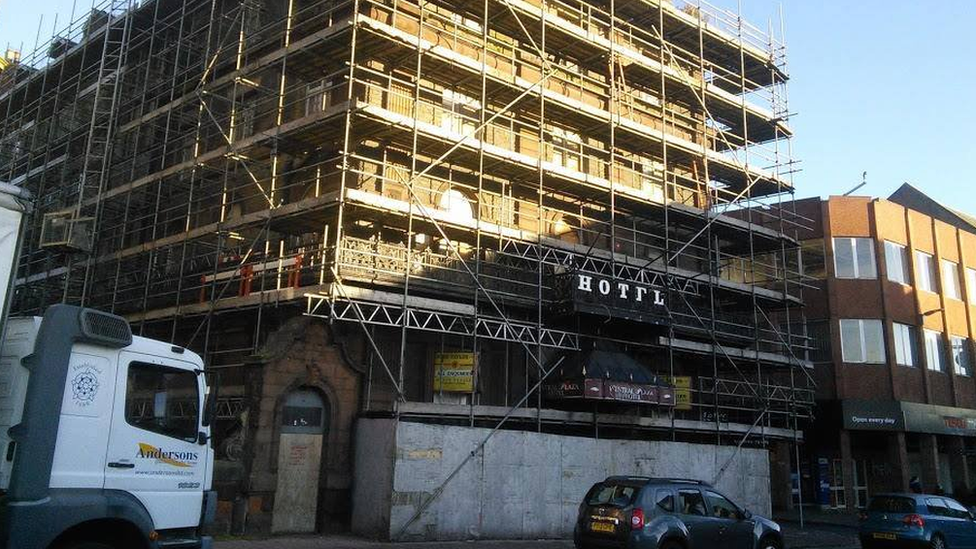 Scaffolding on the derelict Central Plaza Hotel