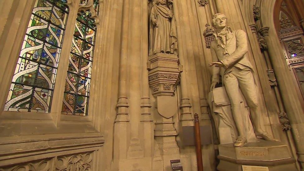 stained glass and statue