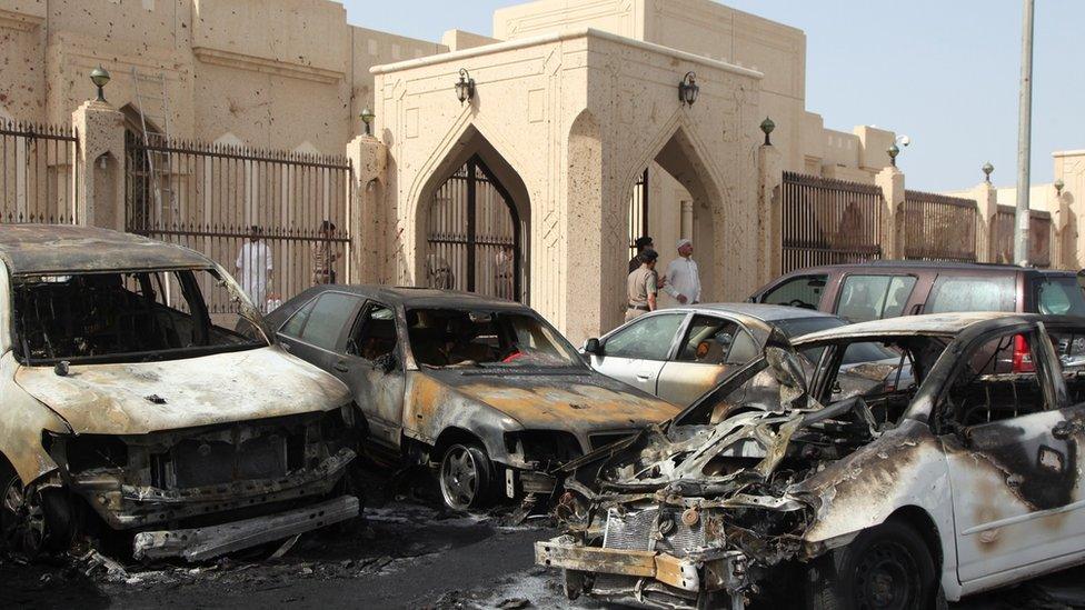 Saudi security forces inspect the site of a suicide bombing that targeted a Shia mosque in Dammam on 29 May 2015