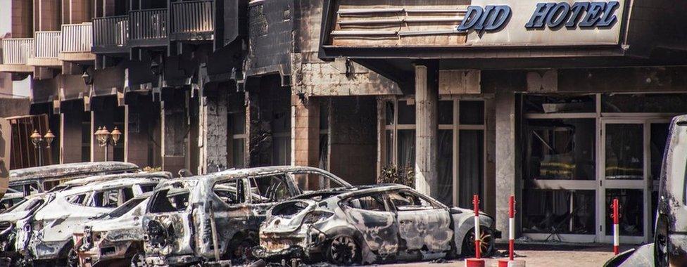 Damaged vehicles outside the Splendid Hotel in Ouagadougou, Burkina Faso, 16 January 2016