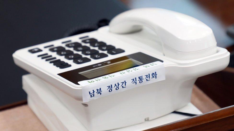 A telephone hotline to North Korea is displayed at the presidential Blue House in Seoul on April 20, 2018.