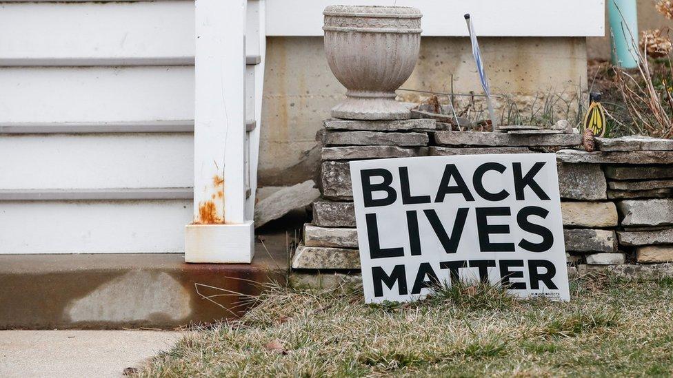 A Black Lives Matter sign sits in a front yard of a house in Evanston, Illinois, on March 16, 2021