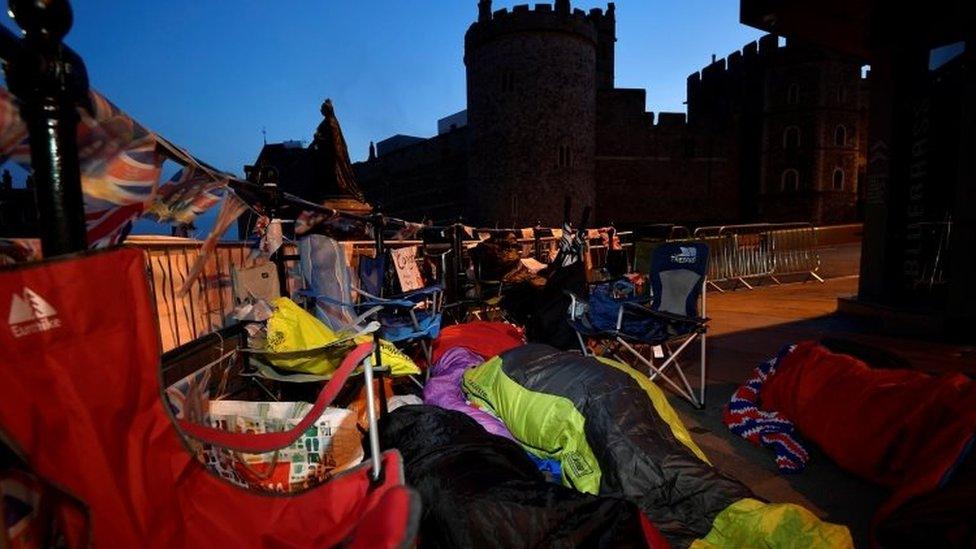 Royal fans sleep on the pavement outside Windsor Castle